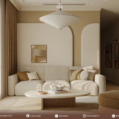 Góc nhìn tổng thể không gian thiết kế phòng khách tối giản tông beige ấm áp với sofa màu kem và đèn thả trần tinh tế.