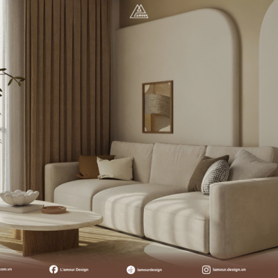 Ánh sáng tự nhiên chiếu qua rèm cửa làm nổi bật vẻ đẹp mộc mạc của ghế sofa trong thiết kế phòng khách tối giản màu beige.